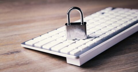 a computer keyboard with a padlock on top of it - Data Protection Law