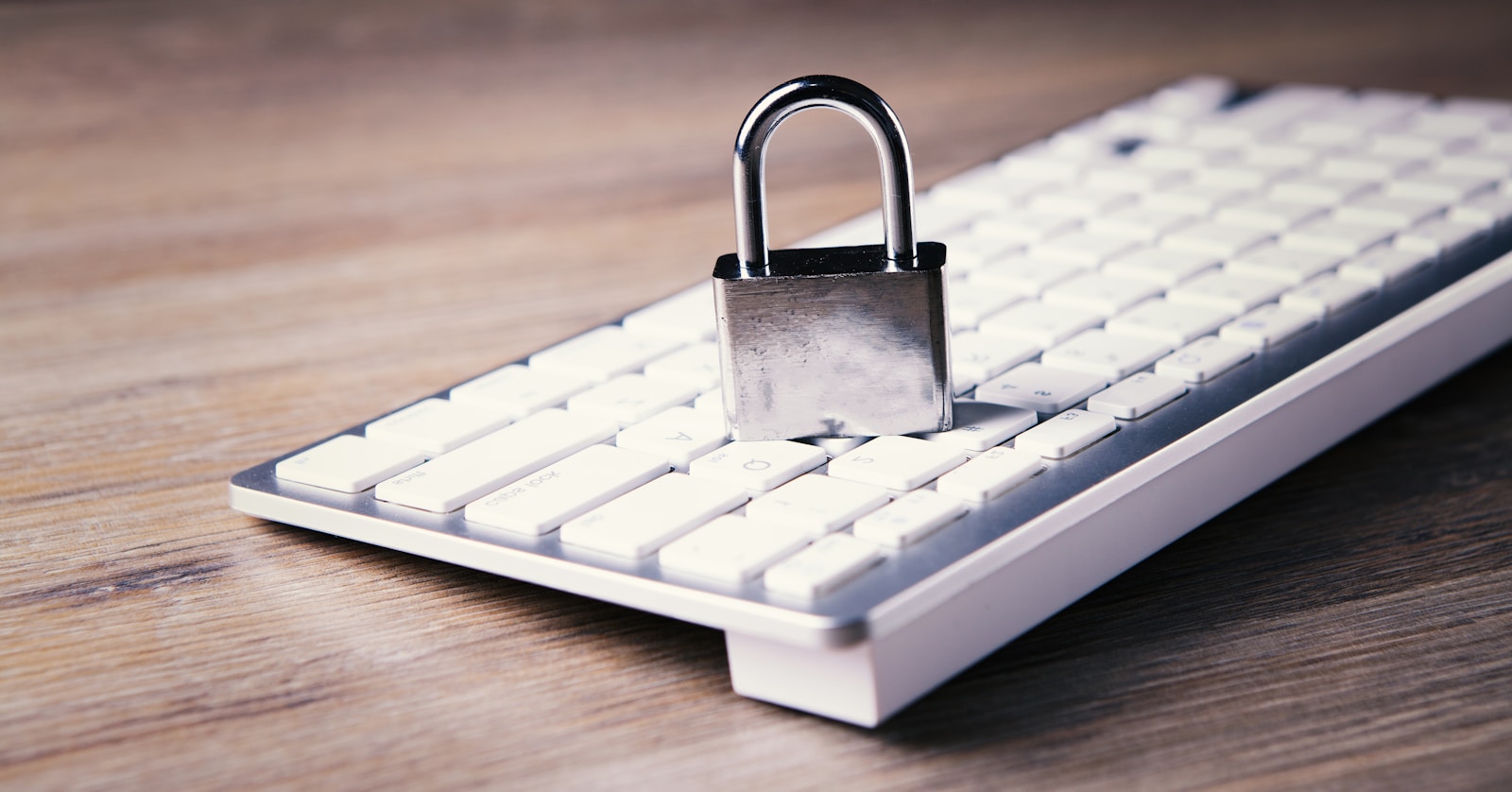 a computer keyboard with a padlock on top of it - Data Protection Law