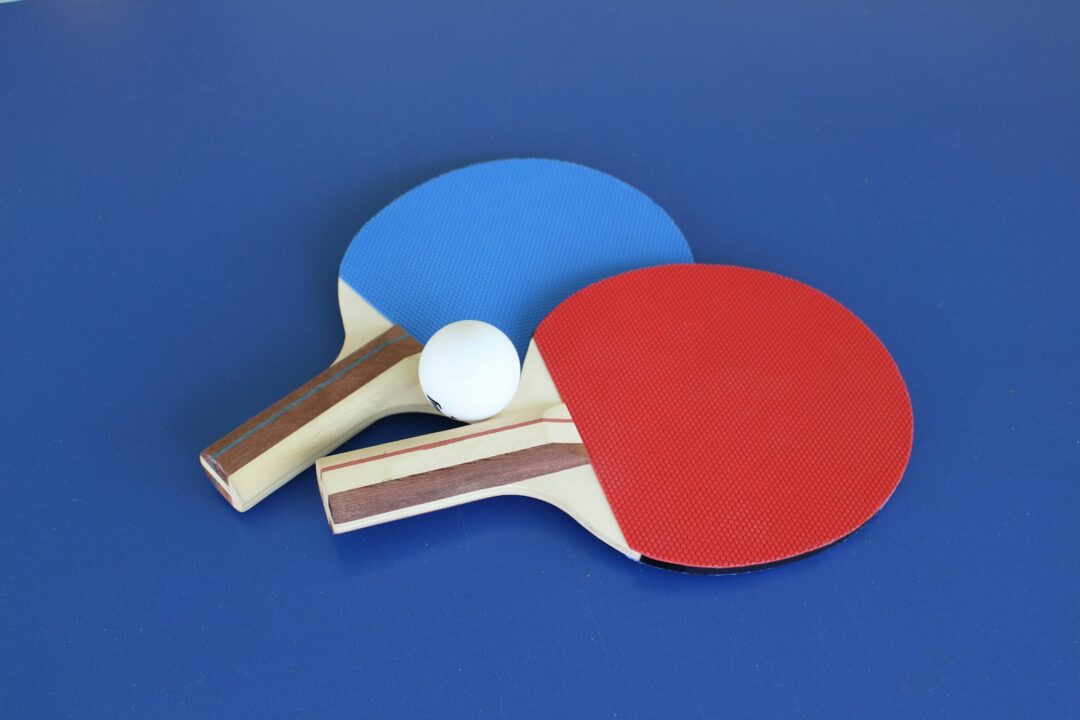 blue and white ball and white golf club - Indian Sports
