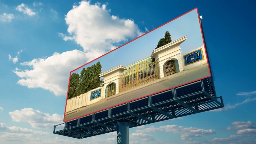 A billboard with a picture of a building on it - real estate advertisements