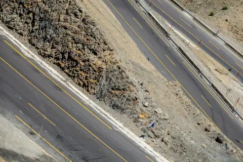Courts Have Failed Arbitration: Arbitration Has - Aerial view of mountain roads showcasing infrastructure and landscape.