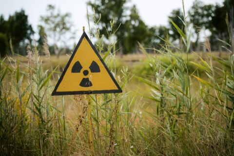 yellow and black road sign - Management of Contaminated Sites