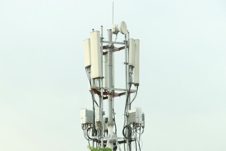 white and silver steel stand