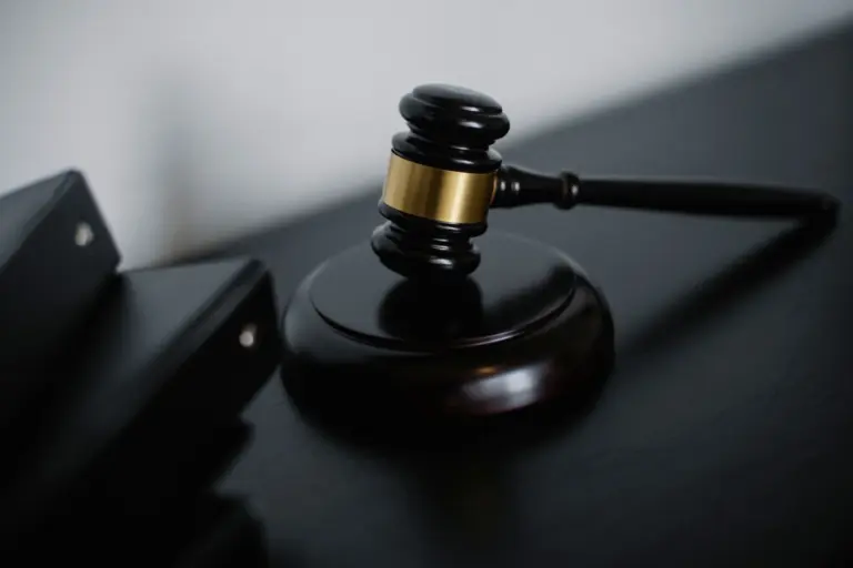 NCLAT Reaffirms: Concluded Auctions Cannot Be - High angle of shiny wooden ceremonial mallet with golden detail placed on jud