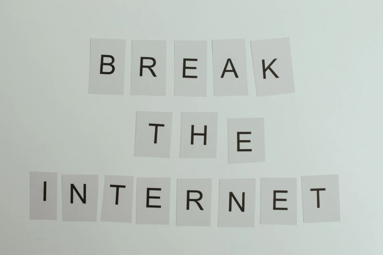Patents And Panels: Decoding Arbitrability of - Conceptual image with text 'Break the Internet' using letter cards on a light