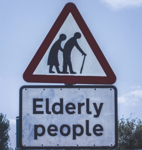 elderly people crossing road sign - Senior Citizens