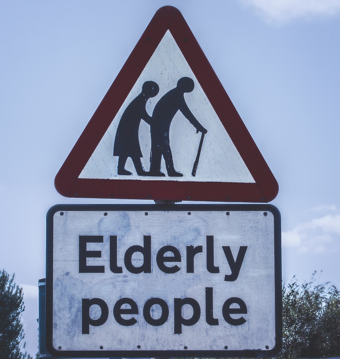 elderly people crossing road sign - Senior Citizens