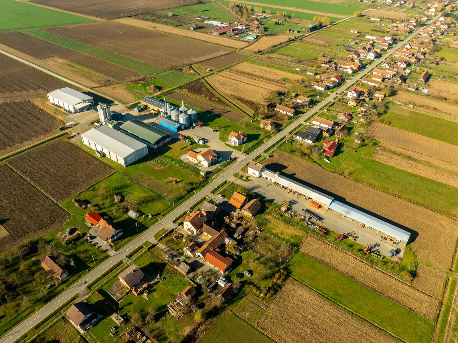 supreme court residential sale deed compensation - Aerial view of rural landscape in Garešnica, Croatia with farmlands and bu