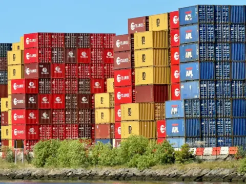 environmental clearance validity ports harbours - - Vibrant shipping containers stacked at West Melbourne port, symbolizing A