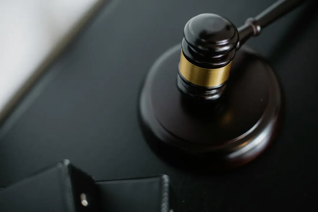 legal metrology packaged commodities amendment rules - From above of wooden gavel on round surface near folders on table in c