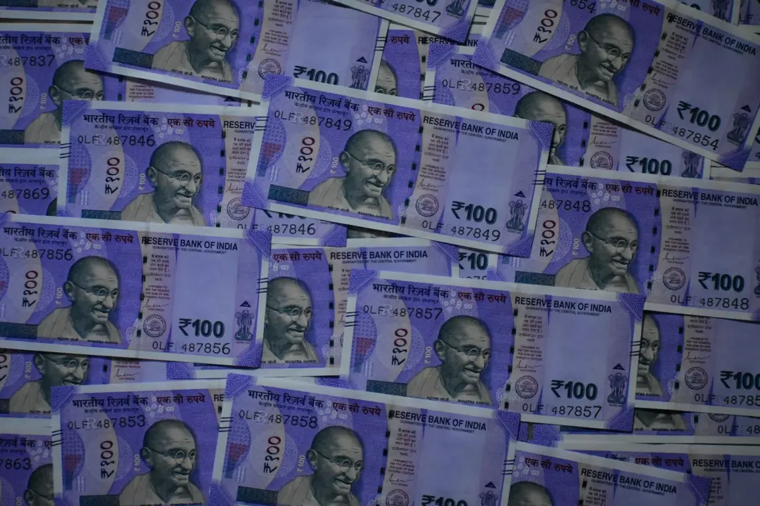 SARFAESI limitation guarantor enforcement - Procedural - Close-up image of Indian Rupee banknotes in Kolkata, India showcasin