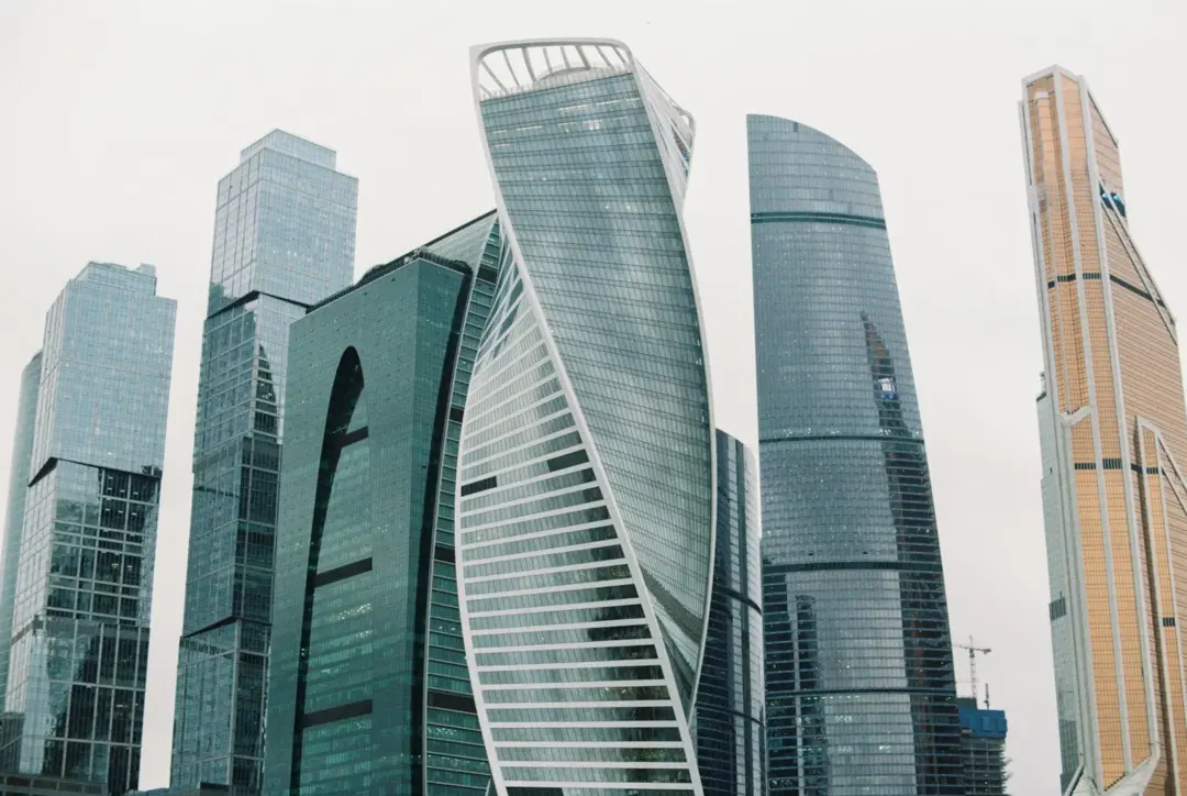corporate veil real estate insolvency - - From below of contemporary skyscrapers in city street of megapolis in cloudy day