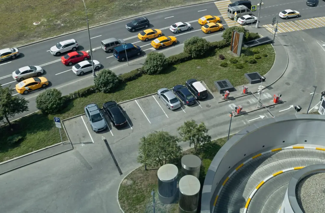 stationary vehicle parking highway liability - - Aerial shot of traffic and parking area in Moscow, showcasing urban life and