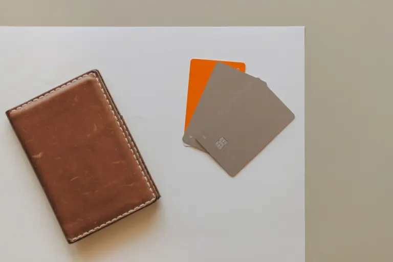 karnataka high court bank account freezing - A leather wallet and credit cards on a minimalist background, ideal for financia