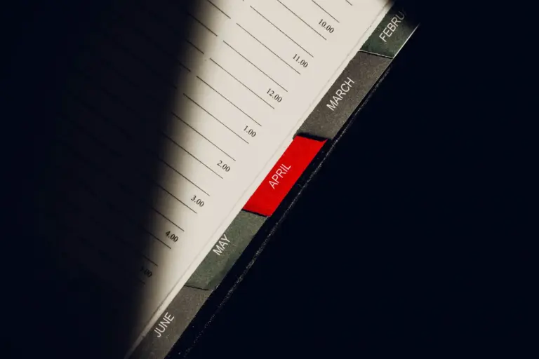 section 8 arbitration waiver - Section - A close-up shot of a planner highlighting the month of April with visible monthly ta
