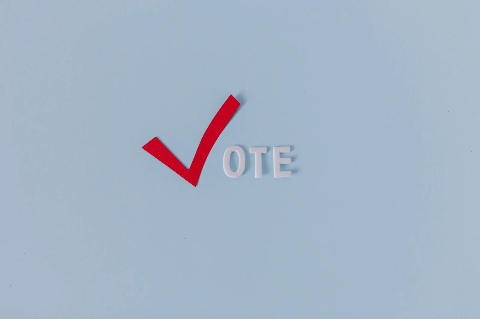 Supreme Court Rejects ‘Vote-Cast-First’ Rule: Only - Red check mark with the word "VOTE" on a blue background, symbolizing el