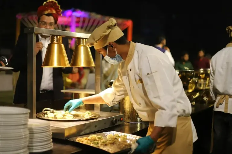 Two Mumbai Kitchens, One Statute: What - Man in white chef uniform cooking