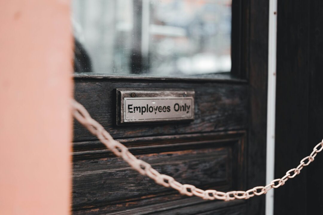 a close up of a door with a chain on it